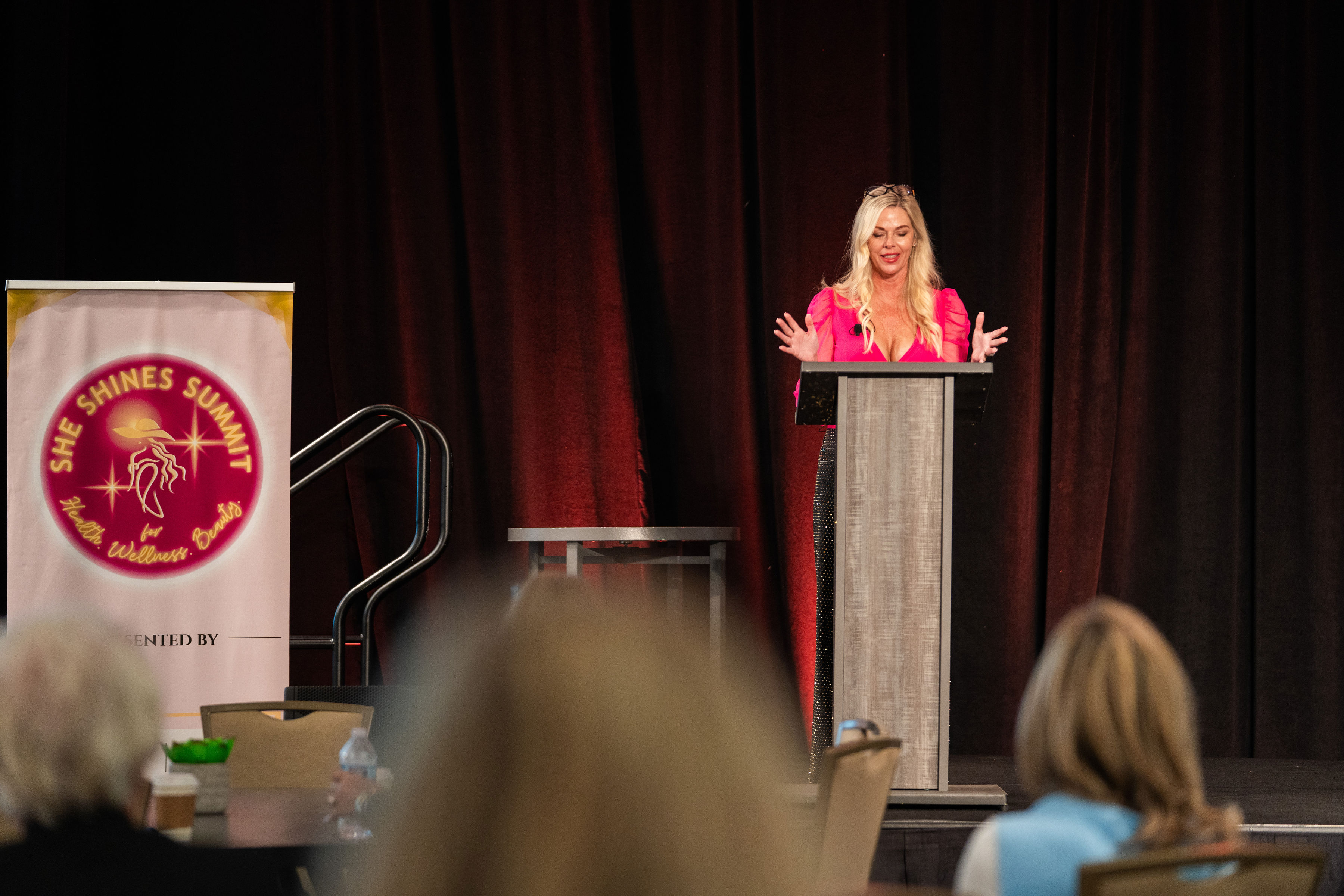 Julie Marvel — Julie Speaking at She Shines, a health, wellness and beauty summit Julie created 2025
