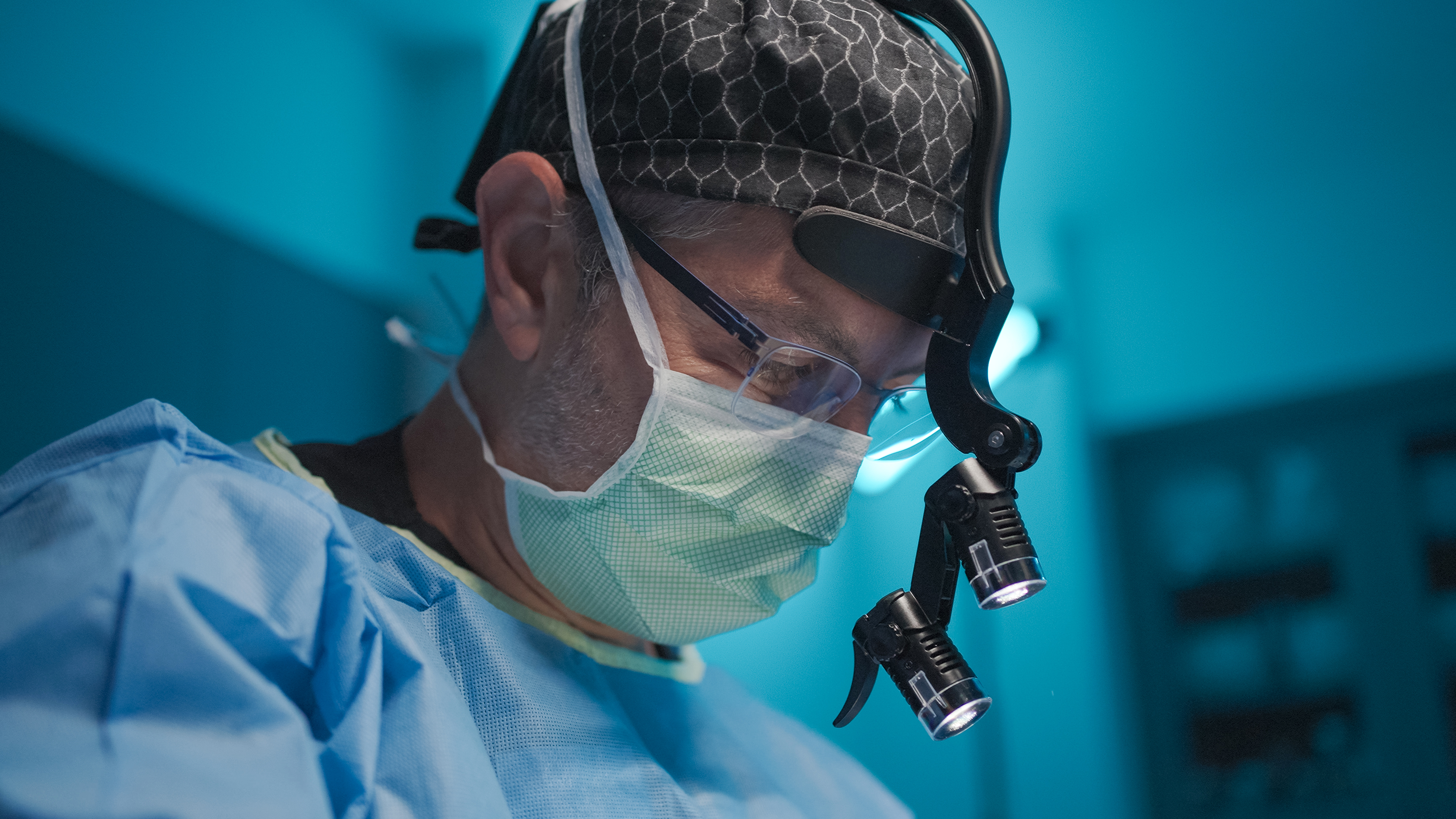 Richard V Balikian, MD FACS — Dr. Richard Balikian performing facial plastic surgery at Aria Surgery Center.