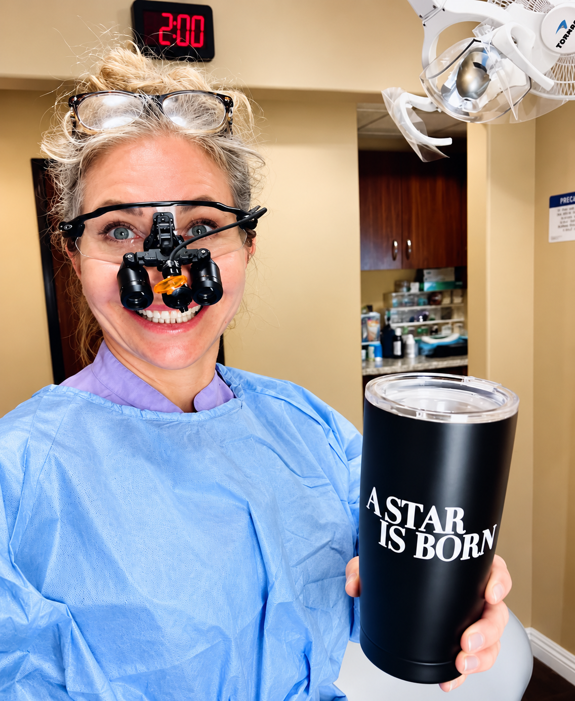 Marta Rudat DDS — Dr. Marta in her element, loupes on and ready to create another smile.